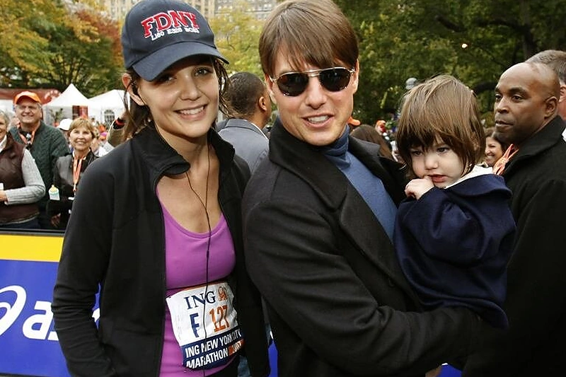 Katie Holmes ir Tomas Cruise'as su dukrele Suri.