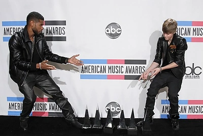 Usheris Raymondas ir Justinas Bieberis / „Reuters“/„Scanpix“ nuotr.