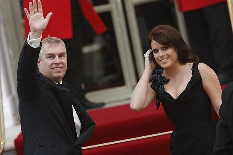 Britanijos princas Andrew su dukra Eugenie