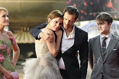 Davidas Heymanas su Emma Watson (centre), J. K. Rowling (kairėje) ir Danielis Radcliffe'as (dešinėje)