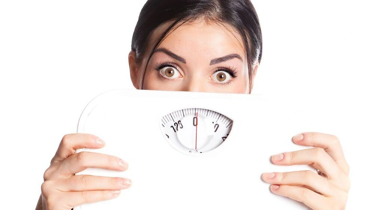 Moteris laiko svarstykles