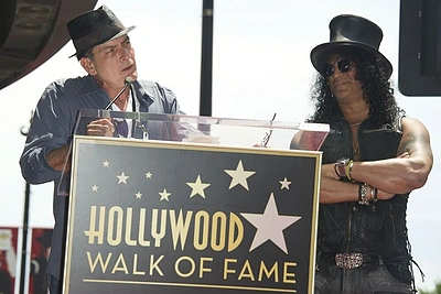 Aktorius Charlie Sheenas ir Slashas