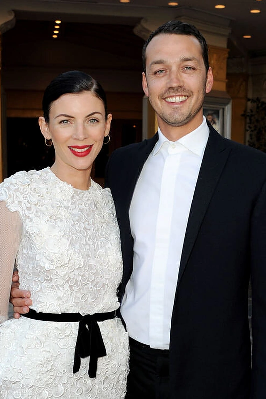 Režisierius Rupertas Sandersas su žmona Liberty Ross