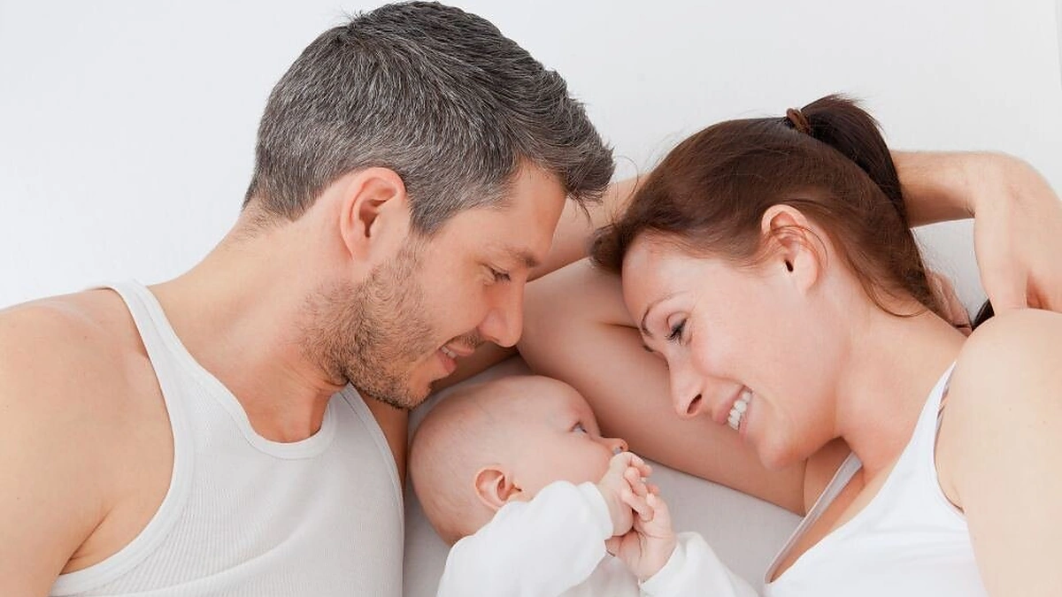 Tėveliai su kūdikiu