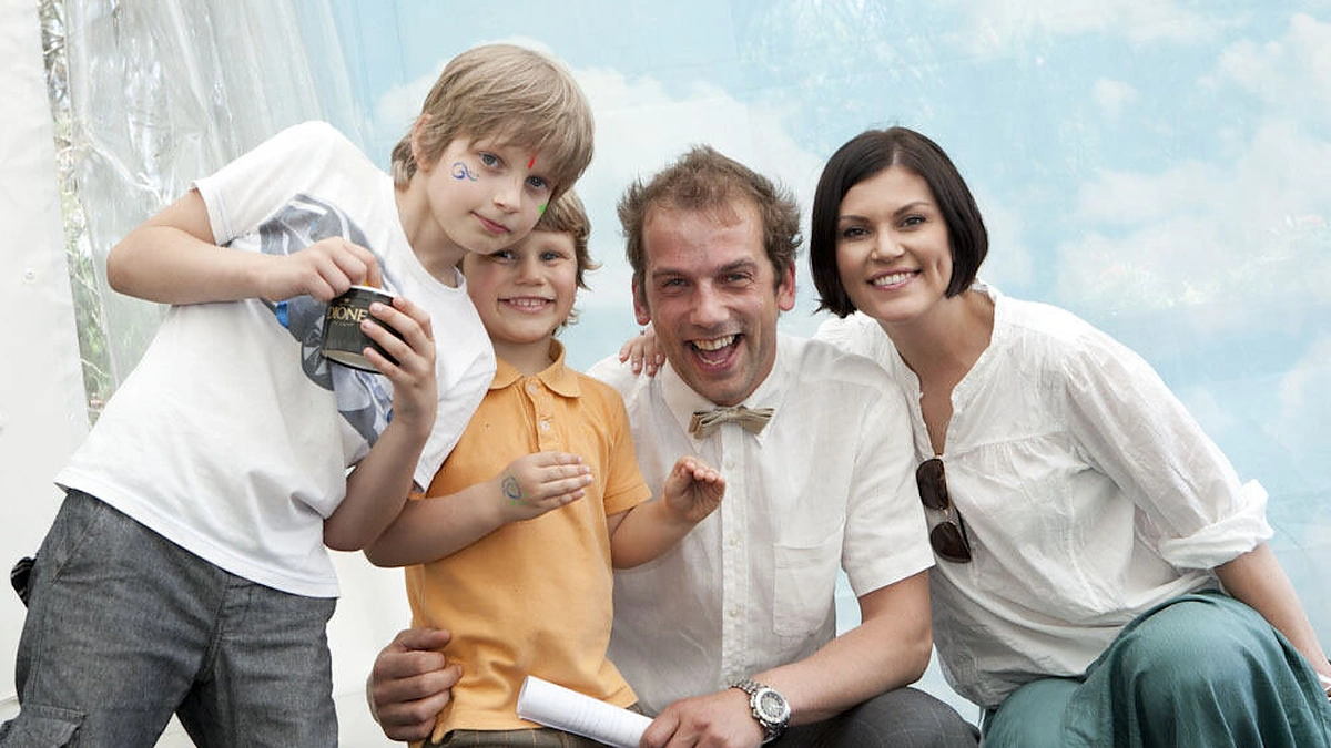 Žygis Stakėnas su žmona ir sūnumis