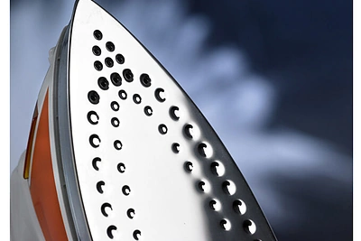 Kaip nuvalyti lygintuvo padą?