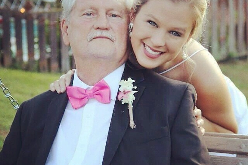 Whitney Moore su tėvu Davidu