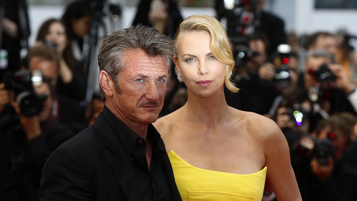 Charlize Theron ir Seanas Pennas