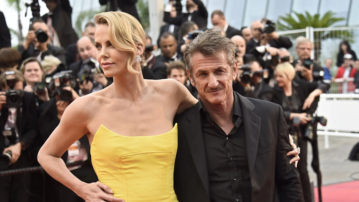 Charlize Theron ir Seanas Pennas