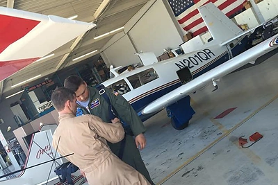 Simonos Milinytė brolis (dešinėje)