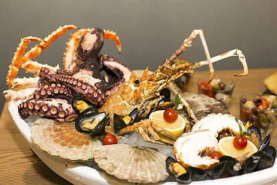 Pasaulio austrių atidarymo čempiono Marselio Lessoille pasirodymas