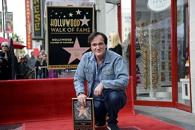 Quentinas Tarantino atidengė savo žvaigždę Holivudo Šlovės alėjoje