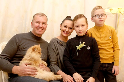 Inga ir Darius Budriai su sūnumis