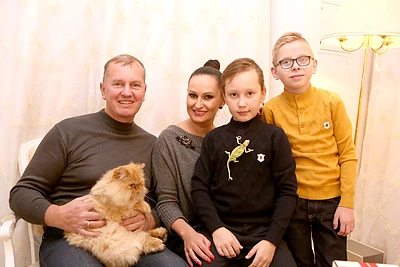 Inga ir Darius Budriai su sūnumis