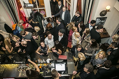 Vyrų mados savaitės vakarėlio akimirka