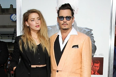 Johnny Deppas ir Amber Heard / „Scanpix“/AP nuotr.