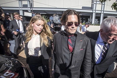 Amber Heard ir Johnny Deppas / „Reuters“/„Scanpix“ nuotr.