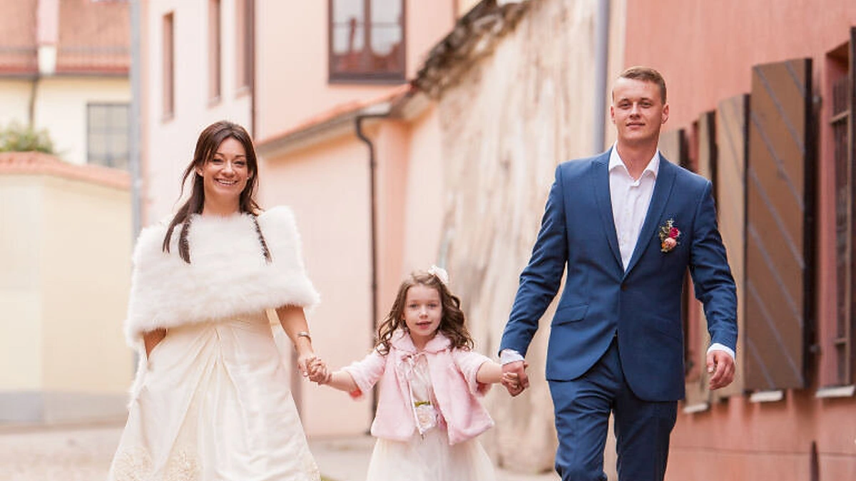 Rūta Lukoševičiūtė su dukra ir Marius Dauda