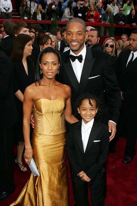 Aktorius Willas Smithas su žmona Jada Pinkett ir sūnumi Jadenu