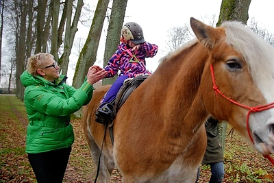 Olimpinę čempionę sujaudino sunkiai sergančią mergaitę auginančios mamos stiprybė
