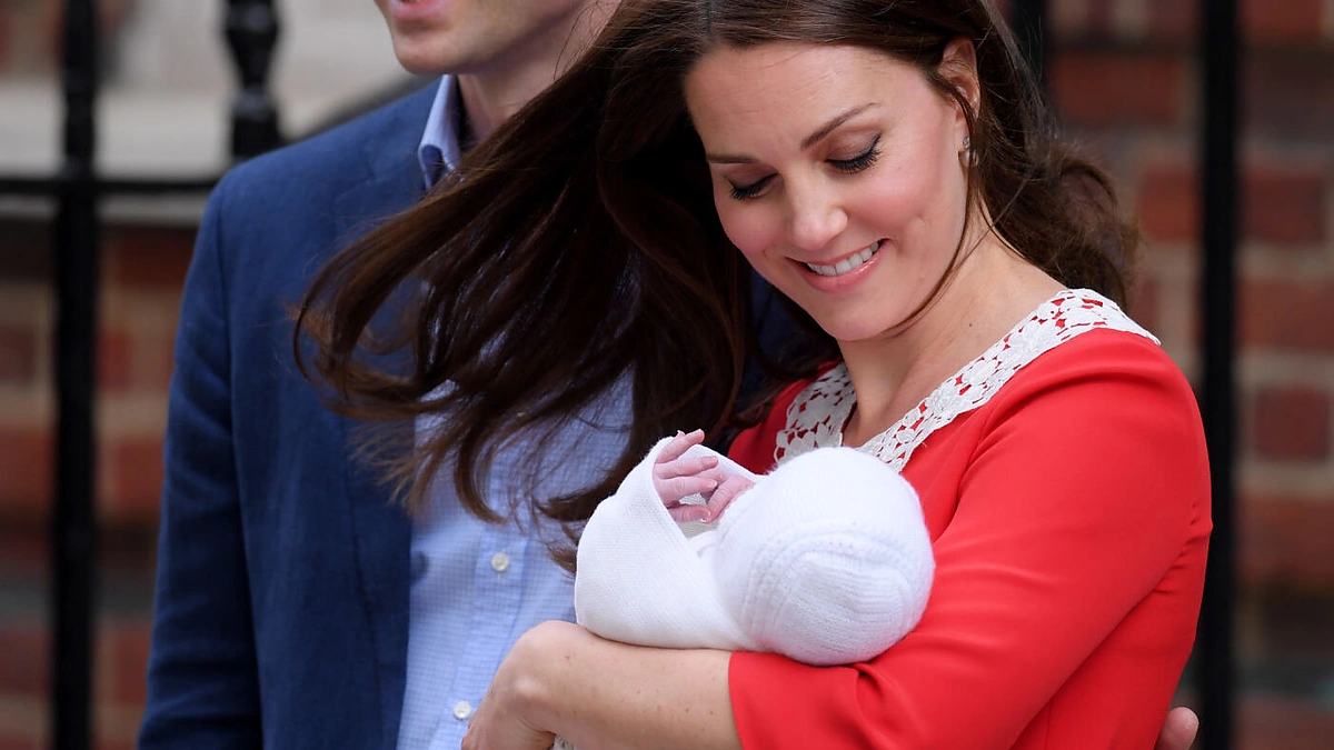 Princas Williamas su žmona Catherine ir sūnumi