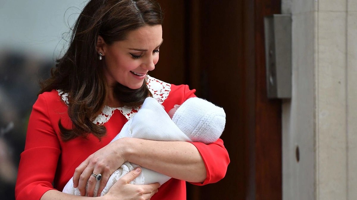Princas Williamas su žmona Catherine ir sūnumi