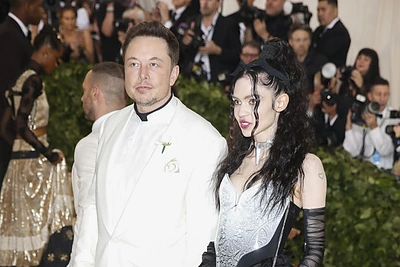 Elonas Muskas ir Grimes / „Scanpix“ nuotr.