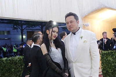 Elonas Muskas ir Grimes / „Scanpix“ nuotr.