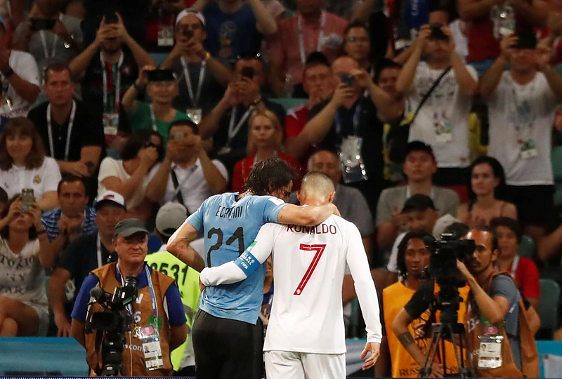 Edisonas Cavani ir Cristiano Ronaldo
