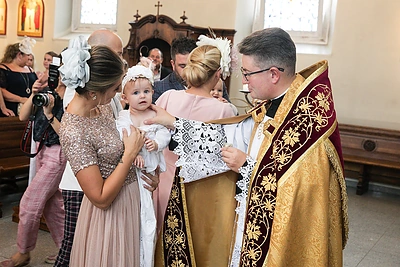 Remigijaus ir Rovenos Žiogų sūnaus krikštynų akimirka