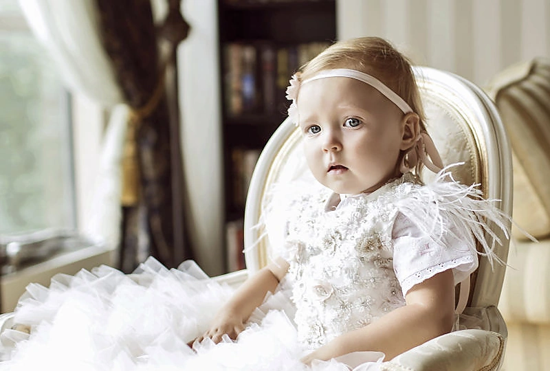 Viktorijos Siegel ir Danieliaus Bunkaus dukters Nicole krikštynų akimirka / Razauskai Photography nuotr.