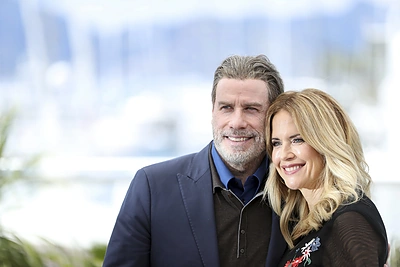 Johnas Travolta ir Kelly Preston buvo viena ryškiausių Holivudo porų, nors ir sklandė gandai apie jųdviejų santykius / Scanpix nuotrauka