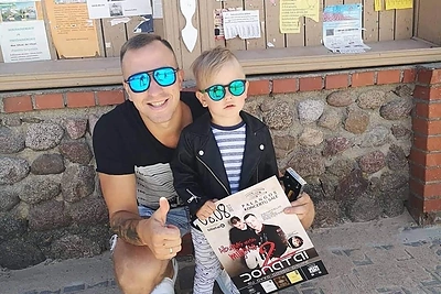 Karolis Akulavičius su sūnumi / Asmeninio albumo nuotr.