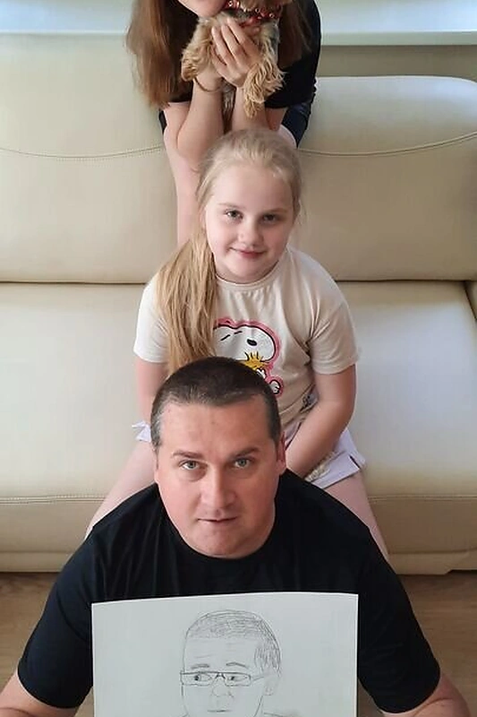 Skirmantas Malinauskas su dukromis / Asmeninio albumo nuotr.