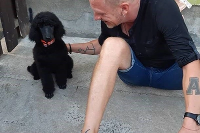 Maksas Melmanas su augintine Leksi / Asmeninio albumo nuotr.