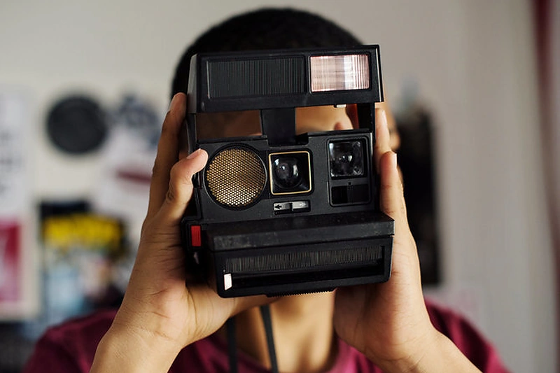 Paauglys su fotoaparatu / 123RF.com nuotr.