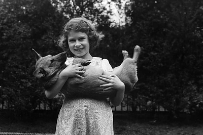 Karalienė Elizabeth II ir jos numylėti korgiai / „Scanpix“ nuotr.