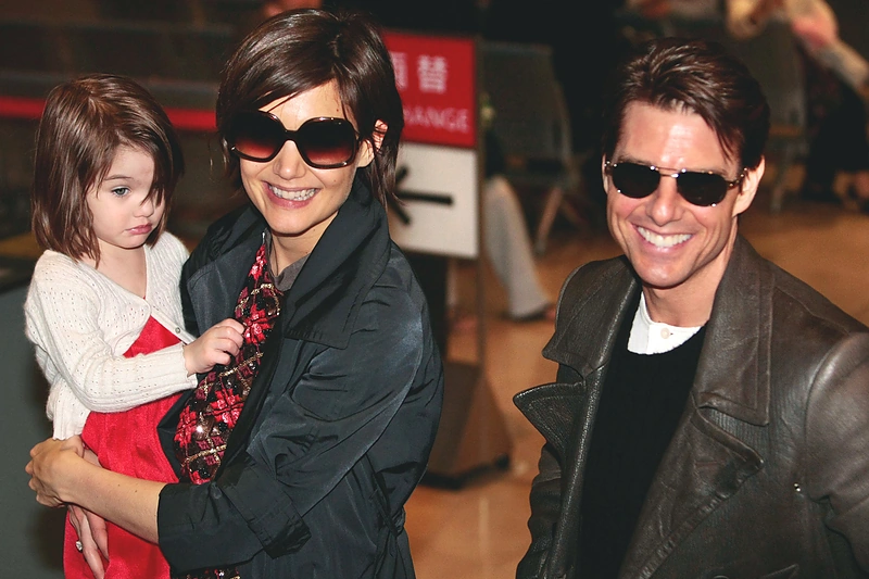 Tomas Cruise'as ir Katie Holmes su dukra Suri / „Scanpix“ nuotr.