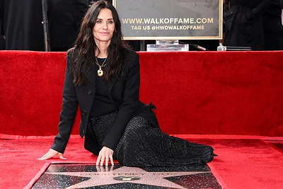 Courteney Cox įteikta žvaigždė Holivudo šlovės alėjoje / AFP/„Scanpix“ nuotr.