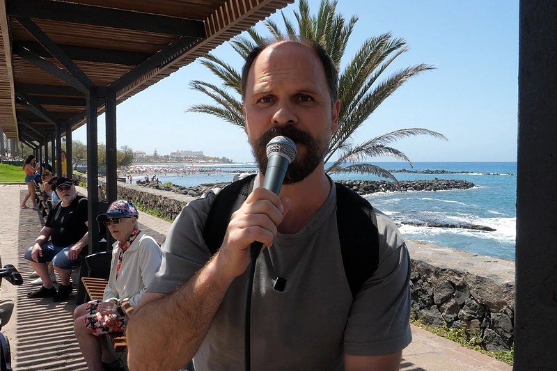 Audrius Bružas ir Leonardas Pobedonoscevas – Tenerifėje / Laidos „Metam monetą“ stopkadras