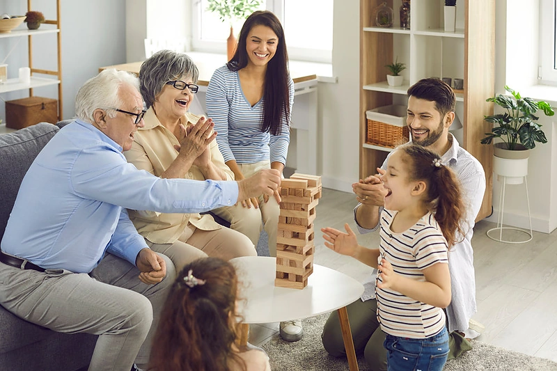 Šeima žaidžia kartu / Shutterstock nuotr.